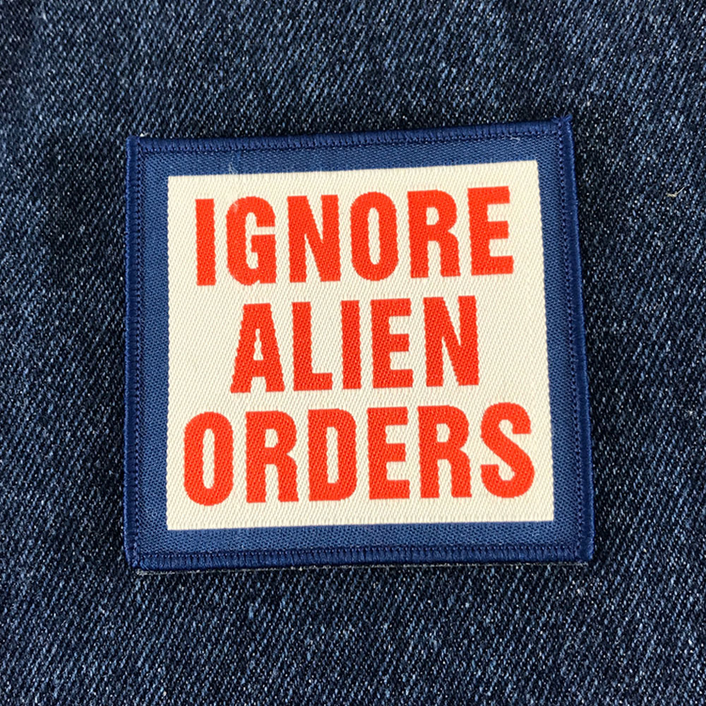 The Joe Strummer Foundation - Sew or Iron on Patch - 'IGNORE ALIEN ORDERS'